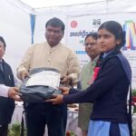 Officials awarding the top student in the painting competition organized on International Museum Day
