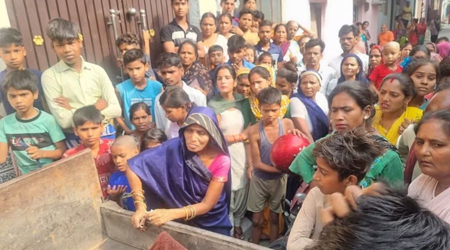 Crowd of people gathered at the spot after murder in Rudrapur