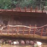 Two people have died after their vehicle fell into a ditch in Dhaulchina